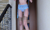 Lacy Nylons 494122 Florence Upskirt Girl Boasts Her Long Legs Encased In Tan Nylons With A Blue Garter Lacy Nylons
