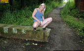 Pissing Outdoor 495850 Teen Blonde Pisses Outdoor On The Road Blocking StoneOutdoor Pissing On The Block Laying On A Road Which Teen Blonde Irina Has Found During Her Looking For A Good Pissing Place Pissing Outdoor
