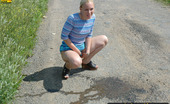 Pissing Outdoor 495925 Outdoor Pissing On A Village RoadOutdoor Pissing Outside The Village Where Blonde Girl Was Spending Her Summer Vacations Pissing Outdoor
