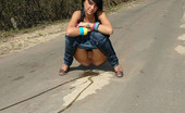 Pissing Outdoor 495926 Outdoor Pissing On Asphalt PathTeen Brunette Nata Pissing Outdoor On A Park Asphalt Path Where People Will Walk Later Pissing Outdoor
