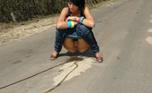 Pissing Outdoor Outdoor Pissing On Asphalt PathTeen Brunette Nata Pissing Outdoor On A Park Asphalt Path Where People Will Walk Later Pissing Outdoor
