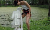 Pissing Outdoor 495955 Teen Pissing Outdoor On A StatueTeen Brunette Valeria Pissing Outdoor On The White Statue In The Forest And Pisses It All Over Pissing Outdoor
