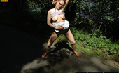 Pissing Outdoor 496037 Asphalt PissingBlonde Pissing On A Park Asphalt Footpath Pissing Outdoor
