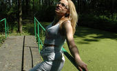 Pissing Outdoor 496037 Asphalt PissingBlonde Pissing On A Park Asphalt Footpath Pissing Outdoor
