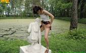 Pissing Outdoor 496084 Statue PissingHot Brunette Peeing In A Garden Of Statues Pissing Outdoor
