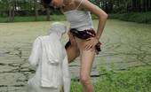Pissing Outdoor 496084 Statue PissingHot Brunette Peeing In A Garden Of Statues Pissing Outdoor
