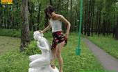 Pissing Outdoor 496084 Statue PissingHot Brunette Peeing In A Garden Of Statues Pissing Outdoor
