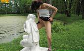 Pissing Outdoor 496084 Statue PissingHot Brunette Peeing In A Garden Of Statues Pissing Outdoor
