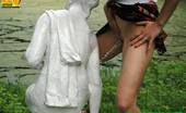 Pissing Outdoor 496084 Statue PissingHot Brunette Peeing In A Garden Of Statues Pissing Outdoor
