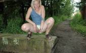 Pissing Outdoor 496100 Denim PissingHottie Pushes Aside Her Panties And Streams Pissing Outdoor
