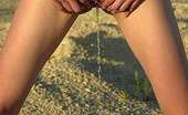 Pissing Outdoor 496125 Naked Girl PeeingNaked Playful Girl Posing And Peeing In Big Steppe Pissing Outdoor
