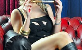 Cigar Glamour 496873 Michelle Monroe Smokes A Cigar Michelle Monroe Wears Long Leather Boots While She Smokes A Cigar Cigar Glamour
