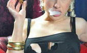 Cigar Glamour 496873 Michelle Monroe Smokes A Cigar Michelle Monroe Wears Long Leather Boots While She Smokes A Cigar Cigar Glamour
