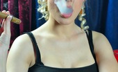 Cigar Glamour 496873 Michelle Monroe Smokes A Cigar Michelle Monroe Wears Long Leather Boots While She Smokes A Cigar Cigar Glamour

