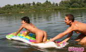 Swing Nudists 498799 Astounding Brunette Chick With A Sexy Tattoo On Her Back Relaxing On Water Swing Nudists
