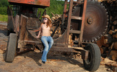 Simply Devon 502468 Devon heads to a wood mill to pose wearing nothing but jeans, sunglasses, and a cowboy hat. Her body looks absolutely stunning in the afternoon sun. Whoa! Simply Devon
