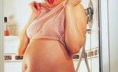 XXX Pregnant Movies 504317 Sexy Preggo Examining Her Pussy And Taking A Shower To Show Off Her Huge Loaded Belly XXX Pregnant Movies
