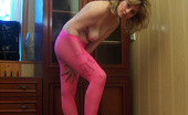 Pantyhose Colors 504859 Magenta Pantyhose Play Of Blonde MomBlonde Mom Klara Wearing Magenta Pantyhose And Posing On The Floor Playing With Her Colored Nylons Pantyhose Colors

