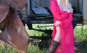 Glam Deluxe 508678 Blond Linda Posing Outdoors In A Sheer Pink Dress Glam Deluxe
