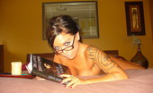 GND Models 509030 Deja Deja Strips Out Of Her Sexy Outfit To Read Topless On Her Bed GND Models
