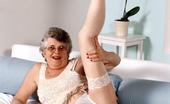 Granny Ultra 509611 Grandma Carol Takes The Time Out To Spread Her Pussy Lips Wide Wearing Her White Sheer Stockings Granny Ultra
