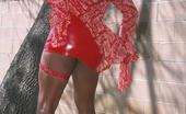 Ebony Romance 512398 Hottie Ebony In Red Latex Dress Stripping Lascivious Outdoors Ebony Romance
