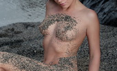 Sun Erotica 512825 Denise Babe With Nice Firm Body Posing Ndue With Black Shawl On The Sand By The Water Sun Erotica
