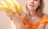 Sugar Paradise 524010 Breathtaking Girl With BananasCaptivating Lass Is Sitting On The Table In Sexy Panties And Is Going To Pet Her Fabulous Pussy With Yellow Appetizing Bananas. Sugar Paradise
