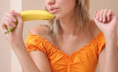 Sugar Paradise 524010 Breathtaking Girl With BananasCaptivating Lass Is Sitting On The Table In Sexy Panties And Is Going To Pet Her Fabulous Pussy With Yellow Appetizing Bananas. Sugar Paradise
