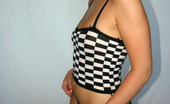GND Amy 528985 Teenage Slut In A Checkered Outfit Showing Off Her Tight Body GND Amy
