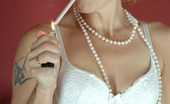 Glamour Smokers 529018 Sasha Mature Smoking Lady Topless In Pearls Glamour Smokers
