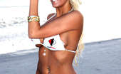 Ember At Home 537651 Ember Reigns Freeones Swimsuit Ember Reigns Poses On The Beach While Wearing A Freeones Swim Suit Ember At Home

