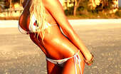 Ember At Home 537651 Ember Reigns Freeones Swimsuit Ember Reigns Poses On The Beach While Wearing A Freeones Swim Suit Ember At Home
