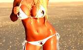 Ember At Home 537651 Ember Reigns Freeones Swimsuit Ember Reigns Poses On The Beach While Wearing A Freeones Swim Suit Ember At Home
