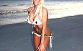 Ember At Home 537651 Ember Reigns Freeones Swimsuit Ember Reigns Poses On The Beach While Wearing A Freeones Swim Suit Ember At Home
