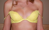 GND Cali 538044 Cali Lifts Her Shirt To Show Off Her Perky Tits In A Bright Yellow Lace Bra GND Cali
