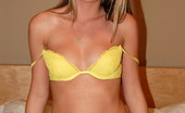GND Cali 538044 Cali Lifts Her Shirt To Show Off Her Perky Tits In A Bright Yellow Lace Bra GND Cali
