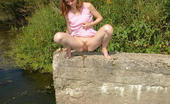 Street Piss Leggy Girl Takes A Riverside Leak Street Piss
