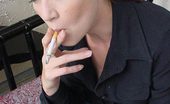 Smoking Divas 551717 Redhead Sneaks A Smoke Smoking Divas
