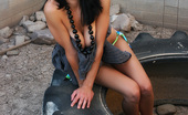 Your Erotic Paradise 553421 Stacey Outside By A Huge Tractor Tire. Your Erotic Paradise
