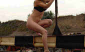 Pee Young 554720 See How This Very Sexy And Busty Blonde Strolls On A Rusty Roof Pee Young
