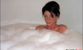 Club GND Carma Carma Grabs Her Huge Tits In The Bubble Bath Club GND
