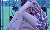 ePantyhose Land 560248 Dolores Tall And Slim Gal In A Summer Dress And Barely Visible Hose Strips Outdoors ePantyhose Land
