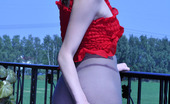 ePantyhose Land 560260 Beatrice Bold Cutie Gets To Risky Outdoor Flashing In Her Dark Grey Control Top Hose ePantyhose Land
