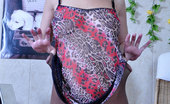 ePantyhose Land 560301 Inessa Bobbed Brunette Fitting Her Smooth Control Top Pantyhose On Her Long Legs ePantyhose Land
