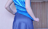 ePantyhose Land 560436 Virginia Smiley Blonde Prankster Slowly Rolling Up Her Black Patterned Pantyhose ePantyhose Land
