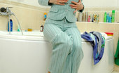 ePantyhose Land 560471 Meggy Office Hottie Gets Dressed In The Bathroom Putting Tan Hose Under Her Pants ePantyhose Land
