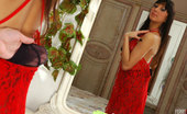 ePantyhose Land 560493 Nell Luscious Hottie In A Red Negligee Sniffs And Changes Into White Dotted Hose ePantyhose Land
