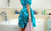 ePantyhose Land 560506 Emilia Blonde Doll In A Baby-Blue Dress Wetting Her Orange Tights In The Bathtub ePantyhose Land
