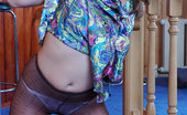 ePantyhose Land 560567 Gertie Frisky Upskirt Teaser Slides A Long Dildo Under Her Black Dotted Pantyhose ePantyhose Land
